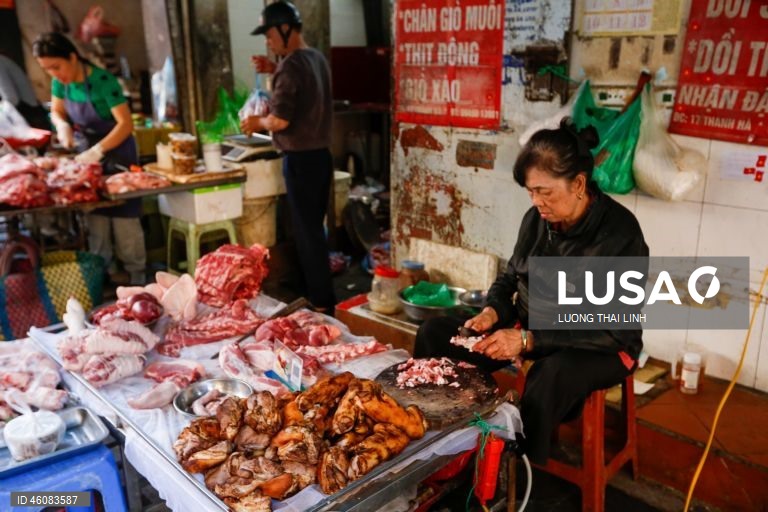 Vietname: Mercado de rua em Hanoi