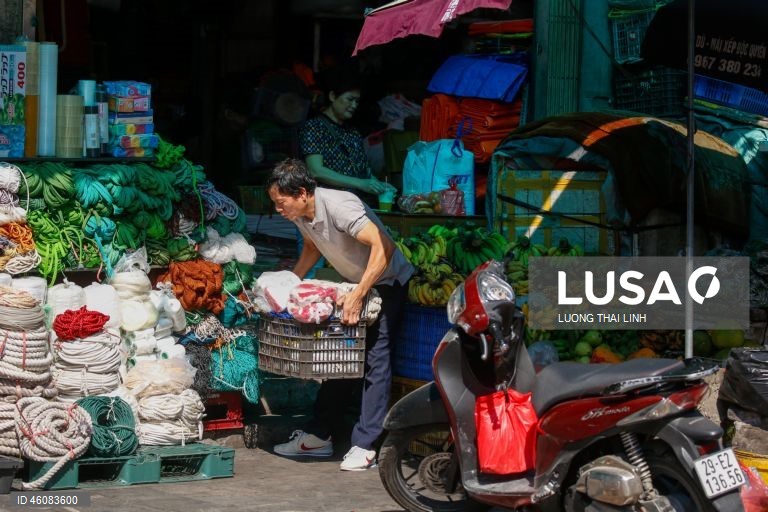 Vietname: Mercado de rua em Hanoi