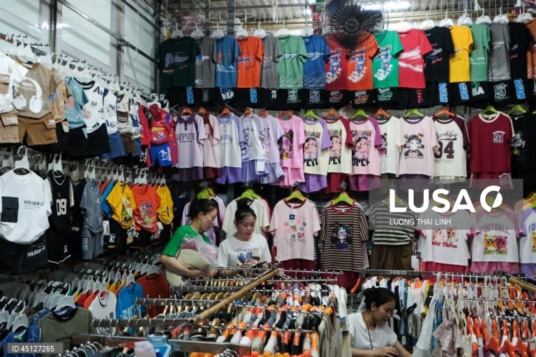 Vietname: Mercado de têxteis em Hanoi