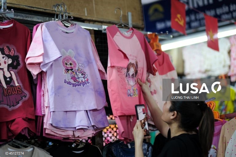 Vietname: Mercado de têxteis em Hanoi