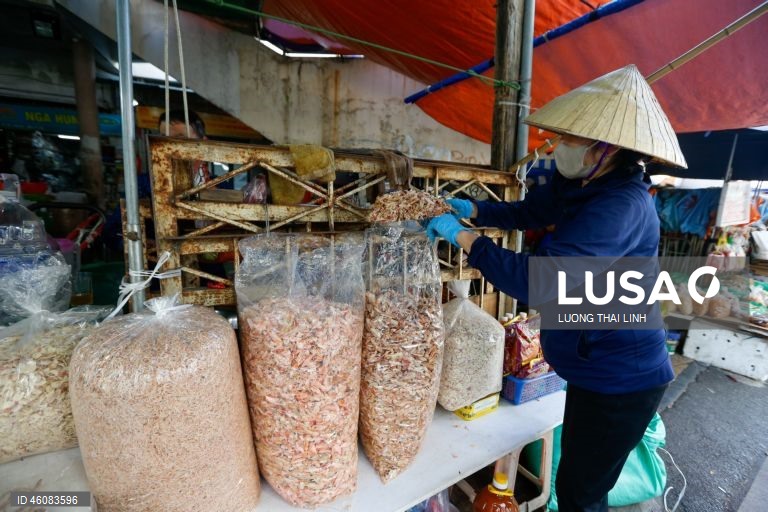 Vietname: Mercado de rua em Hanoi